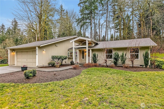 view of front of home with a garage, a shingled roof, concrete driveway, crawl space, and a front yard