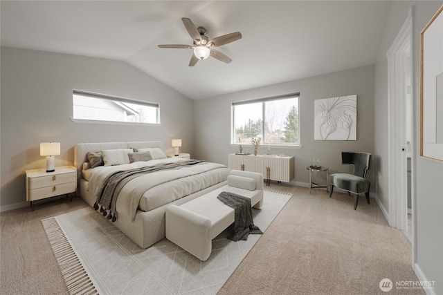 bedroom featuring multiple windows, light colored carpet, radiator heating unit, and vaulted ceiling