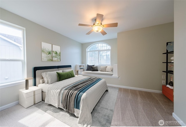 bedroom with carpet flooring, ceiling fan, and baseboards