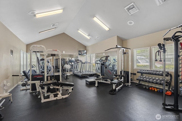 workout area with lofted ceiling, baseboards, and visible vents