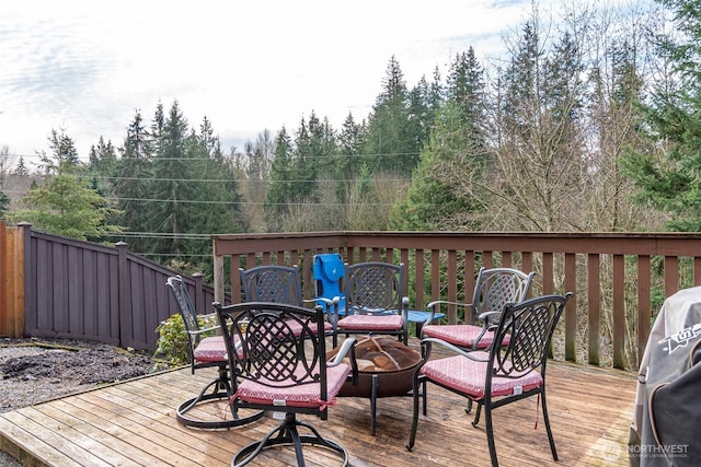 deck with an outdoor fire pit