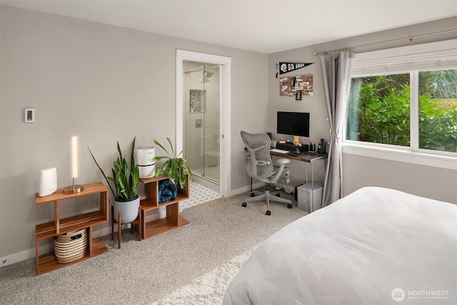 bedroom with carpet and baseboards