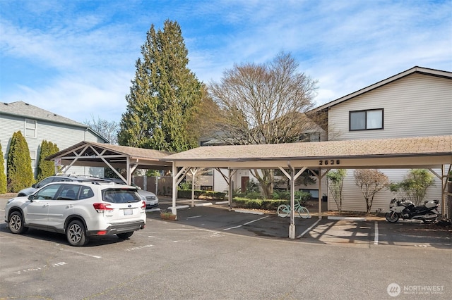 view of partially covered parking lot