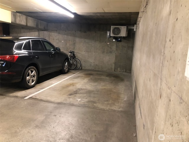 1221 Harbor Ave SW Unit 105, Seattle, WA 98116 - parking garage featuring ac unit
