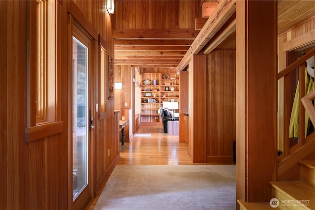 707 NW Thatcher Pass Rd, Decatur Island, WA 98221 - hall with stairway, wooden walls, wood ceiling, and built in features