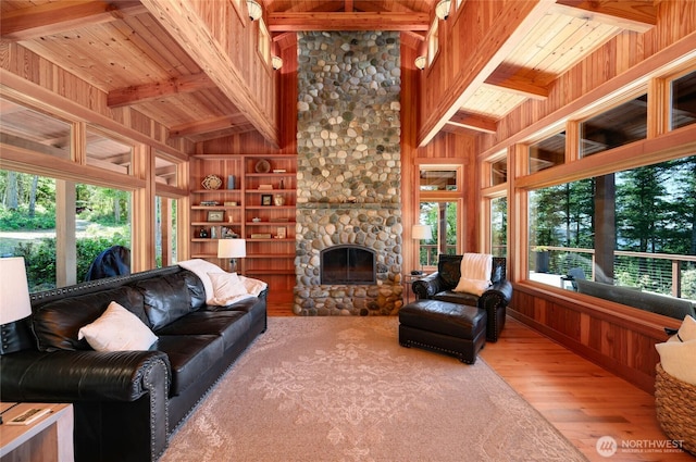 707 NW Thatcher Pass Rd, Decatur Island, WA 98221 - living room featuring wood walls, vaulted ceiling with beams, hardwood / wood-style floors, and wood ceiling