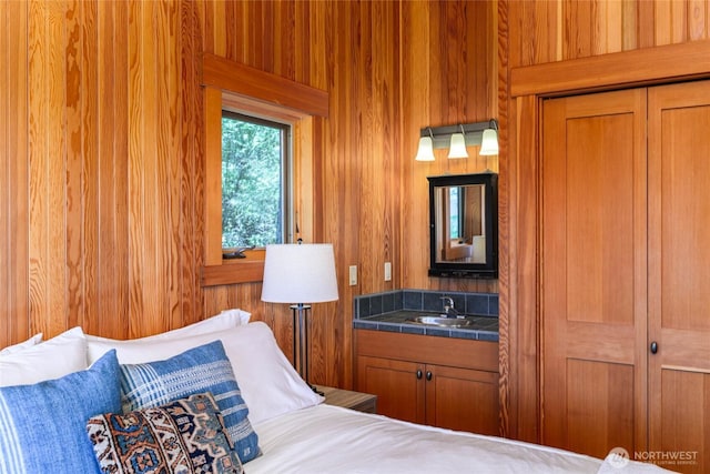 707 NW Thatcher Pass Rd, Decatur Island, WA 98221 - bedroom with wooden walls and a sink
