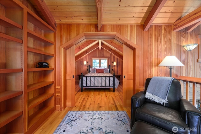 707 NW Thatcher Pass Rd, Decatur Island, WA 98221 - bedroom with wooden walls, wood ceiling, vaulted ceiling with beams, and wood finished floors