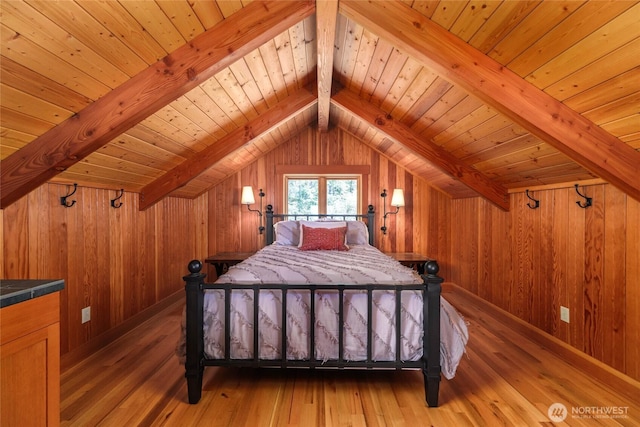 707 NW Thatcher Pass Rd, Decatur Island, WA 98221 - bedroom featuring light wood-type flooring, wooden ceiling, wood walls, and vaulted ceiling with beams