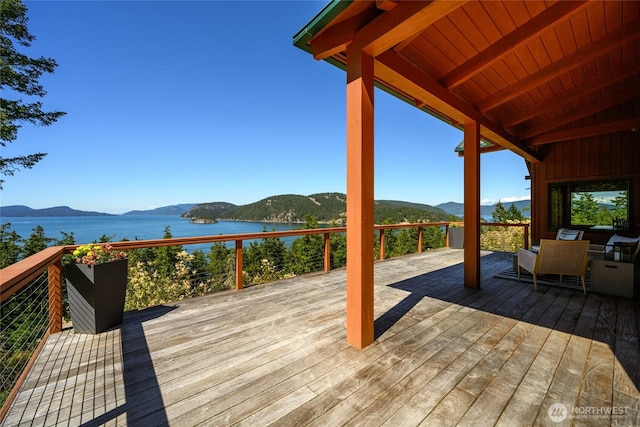 707 NW Thatcher Pass Rd, Decatur Island, WA 98221 - wooden deck featuring a water and mountain view