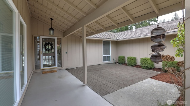 doorway to property with a patio