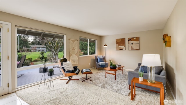 sitting room featuring tile patterned flooring