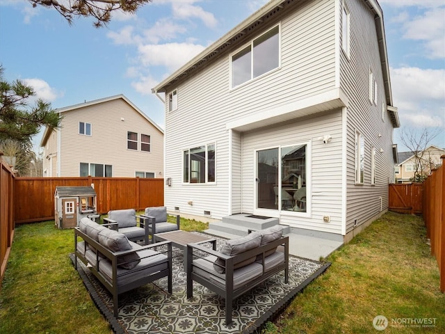 back of property featuring a patio, a lawn, a fenced backyard, and an outdoor hangout area