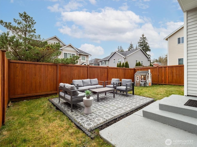 view of patio with a residential view, a fenced backyard, and outdoor lounge area