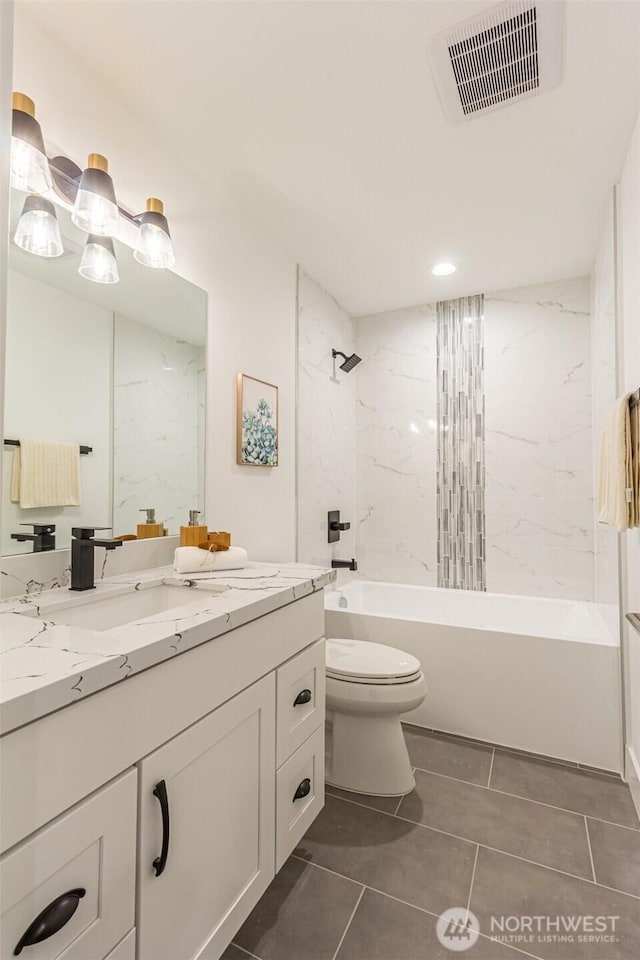 full bath featuring visible vents, toilet, vanity,  shower combination, and tile patterned flooring