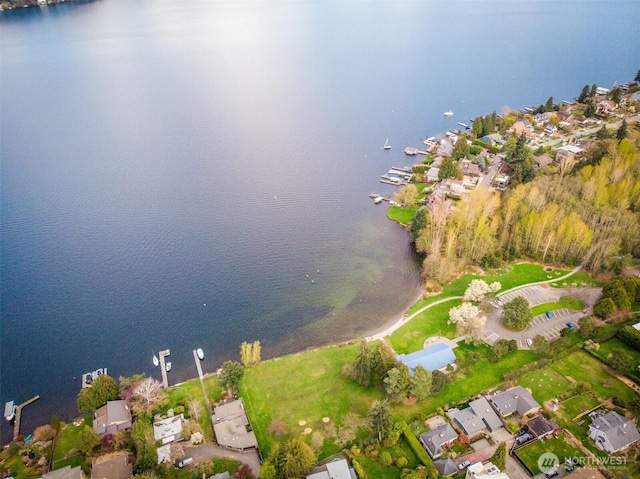 bird's eye view with a residential view and a water view