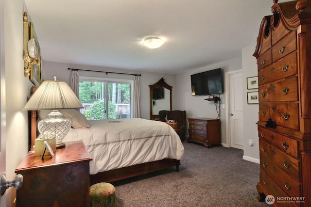 carpeted bedroom with baseboards