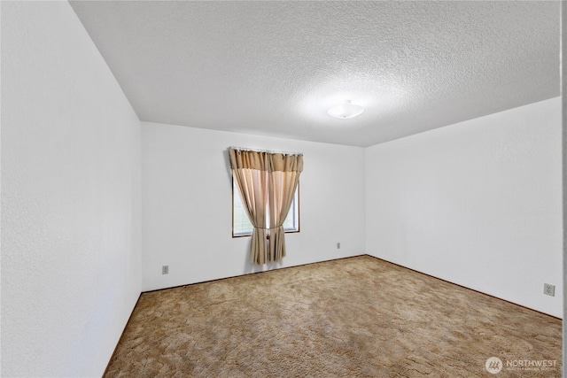 2308 Vista Ln, Anacortes, WA 98221 - carpeted spare room with a textured ceiling