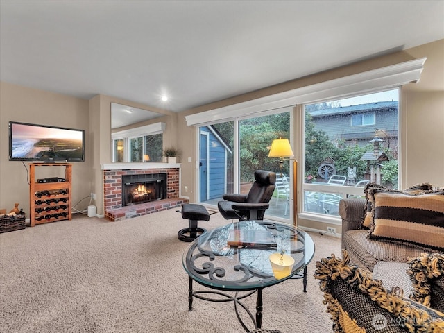 living room featuring carpet floors and a brick fireplace