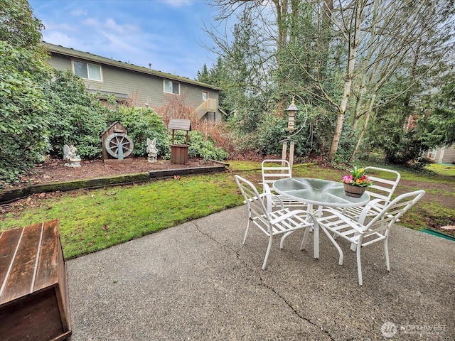 view of patio featuring outdoor dining space