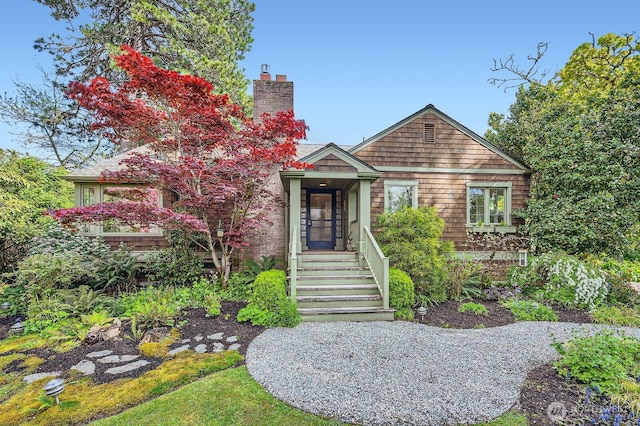 view of front of house with a chimney