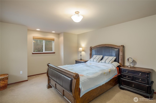 carpeted bedroom featuring recessed lighting and baseboards