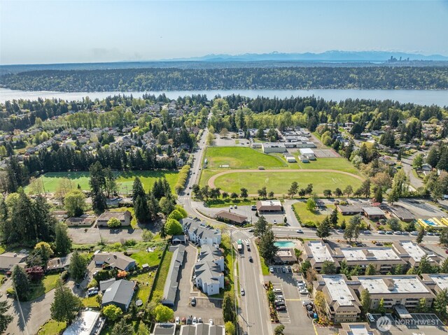 bird's eye view with a water view