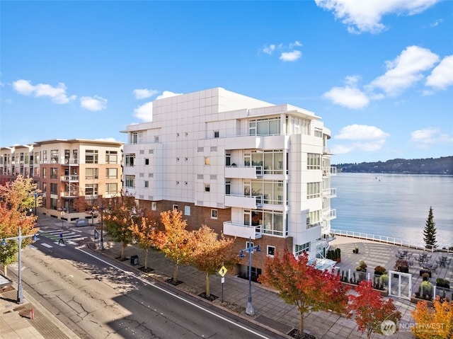 view of property with a water view