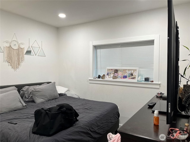 bedroom with recessed lighting