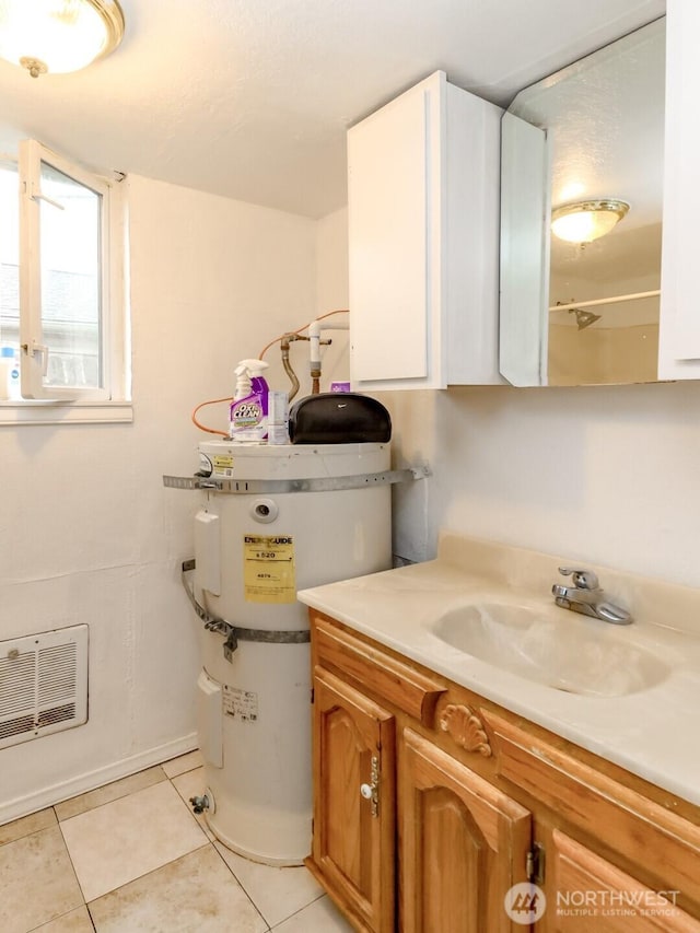 bathroom featuring vanity, tile patterned flooring, and visible vents