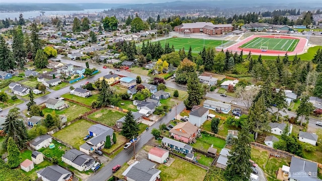 birds eye view of property with a residential view