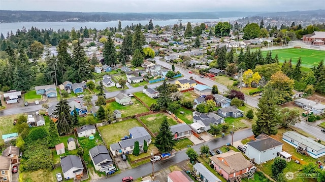 aerial view with a residential view and a water view