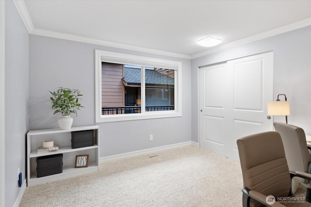 carpeted office featuring baseboards, visible vents, and crown molding