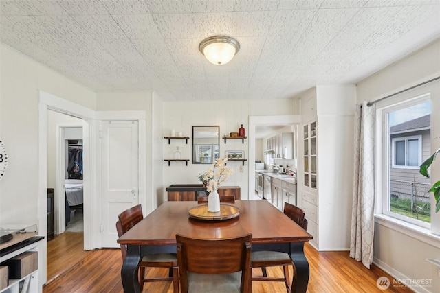 dining area featuring wood finished floors