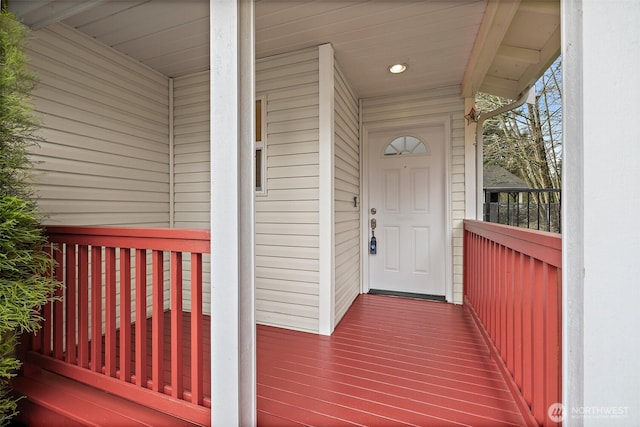 doorway to property featuring covered porch