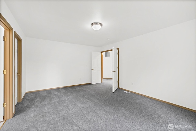 unfurnished bedroom with baseboards and carpet floors