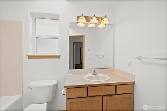 full bath featuring toilet and vanity