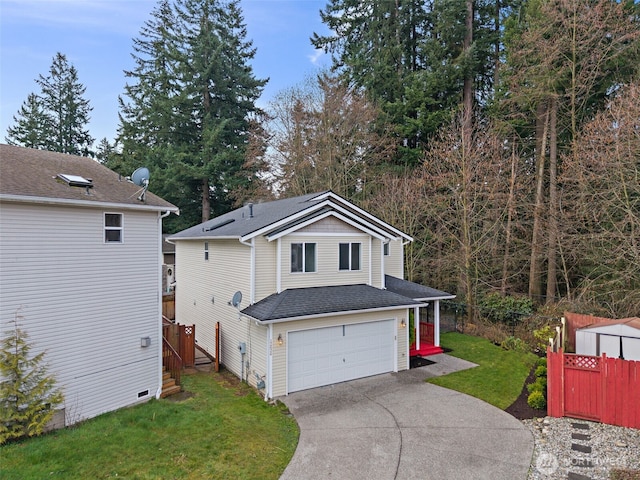 view of side of property with fence, driveway, roof with shingles, an attached garage, and a yard