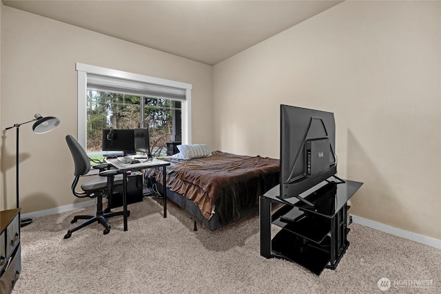 carpeted bedroom with baseboards