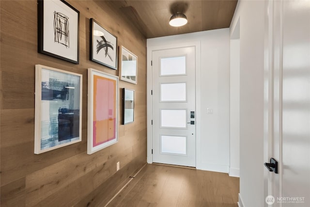 doorway featuring wood finished floors