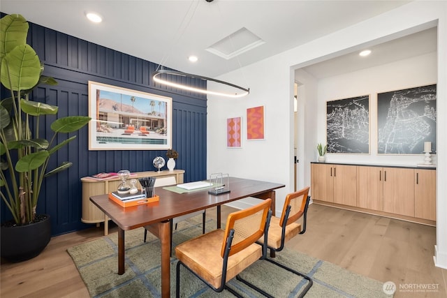 dining room featuring light wood finished floors and recessed lighting