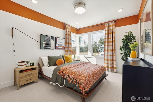 bedroom featuring recessed lighting, baseboards, and light colored carpet