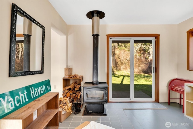 interior space featuring a wood stove