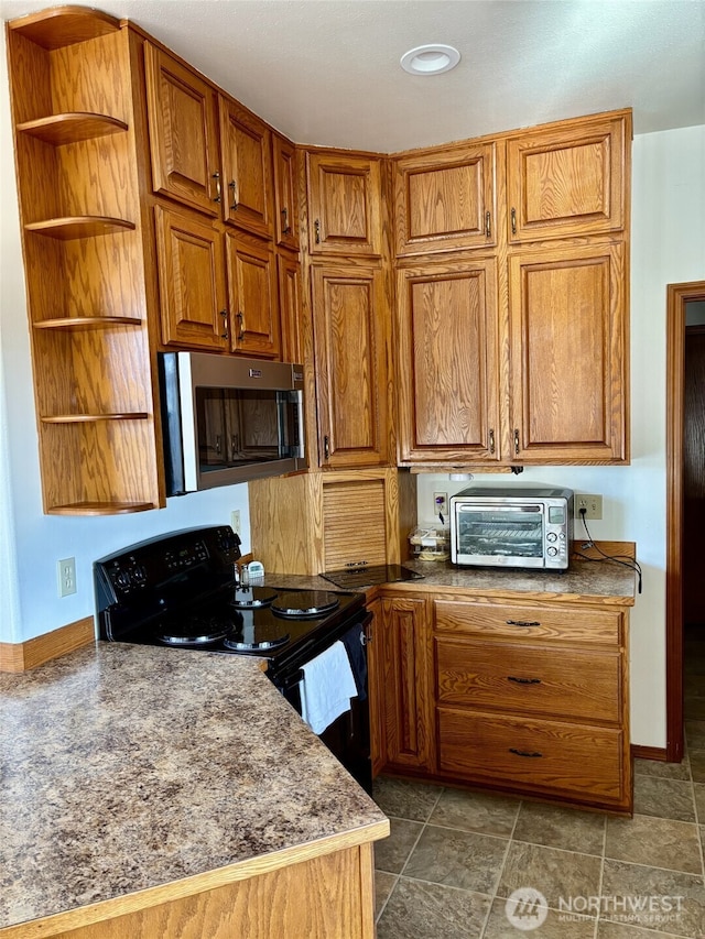 kitchen featuring a toaster, black range with electric stovetop, brown cabinetry, open shelves, and stainless steel microwave