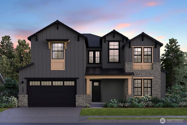 modern farmhouse featuring concrete driveway, brick siding, board and batten siding, and an attached garage