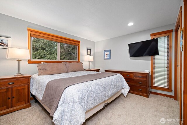 bedroom featuring recessed lighting and light colored carpet