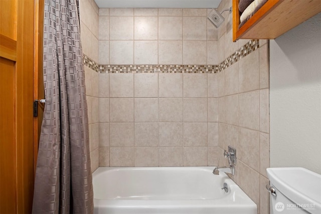 full bath with toilet and shower / bath combo with shower curtain