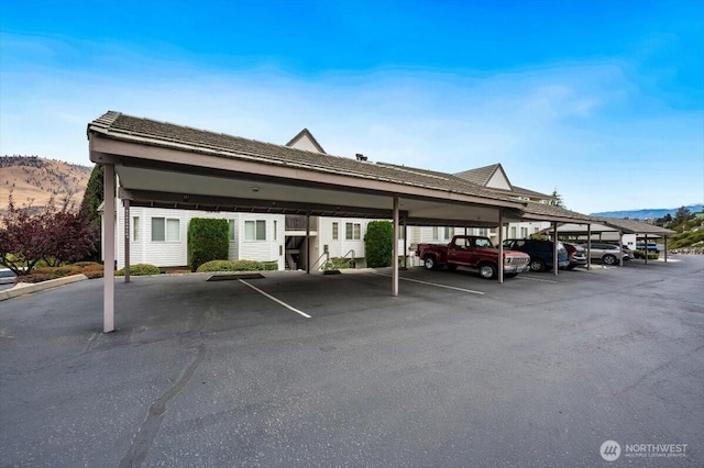 covered parking lot with a mountain view