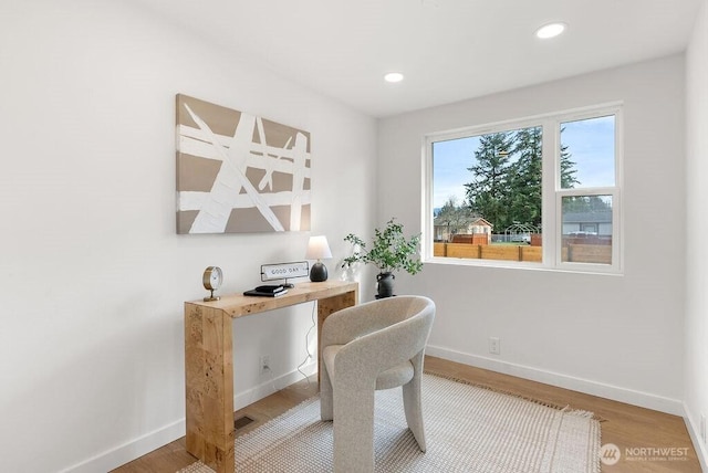 office with recessed lighting, baseboards, and wood finished floors