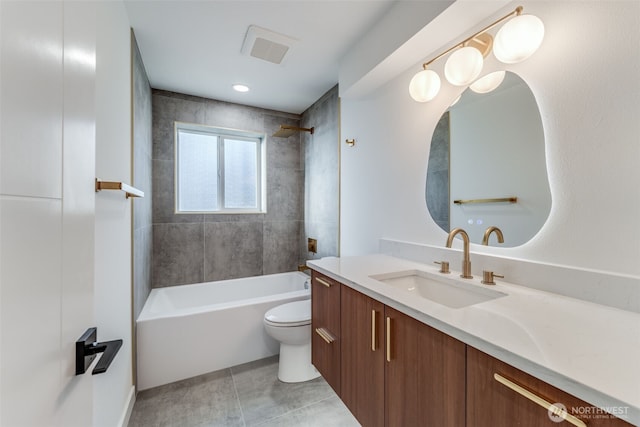 bathroom with toilet, tile patterned flooring, bathing tub / shower combination, and vanity